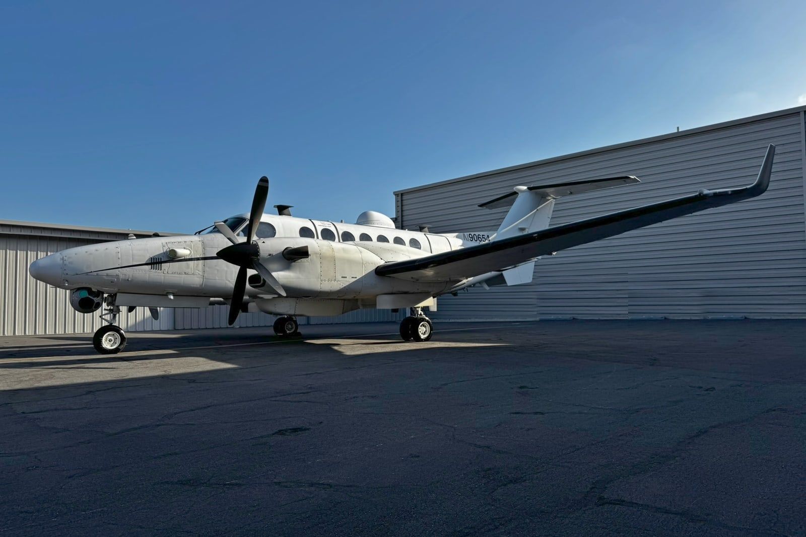 King Air 350ER testbed on the Santa Monica ramp, MX-20 turret under the nose and satcom dome on the cabin roof
